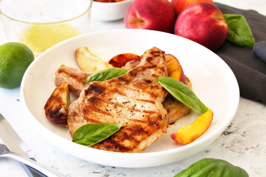 Grilled Pork Chops with Honey-Lime Peaches