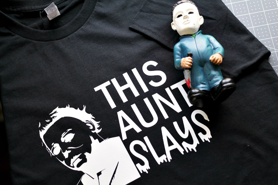 Horizontal photo of This Aunt Slays Shirt with Michael Meyers statue.